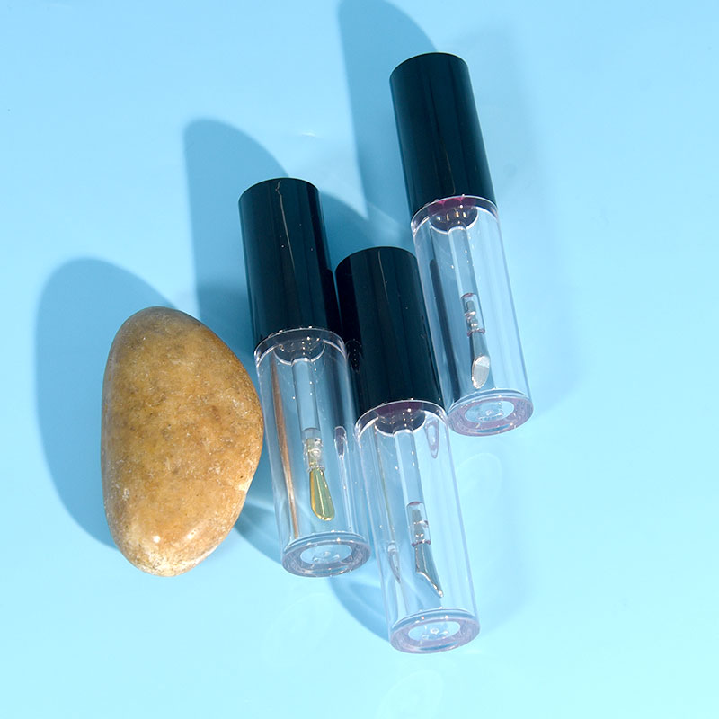 廠家批發(fā)圓形PET材質5ml唇釉管帶小馬蹄型鋅合金金屬刷頭唇彩管